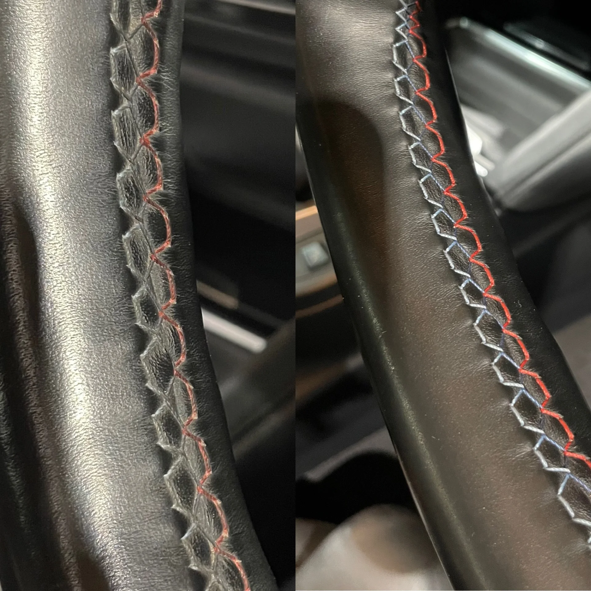 Clean steering wheel with red stitching and textured trim